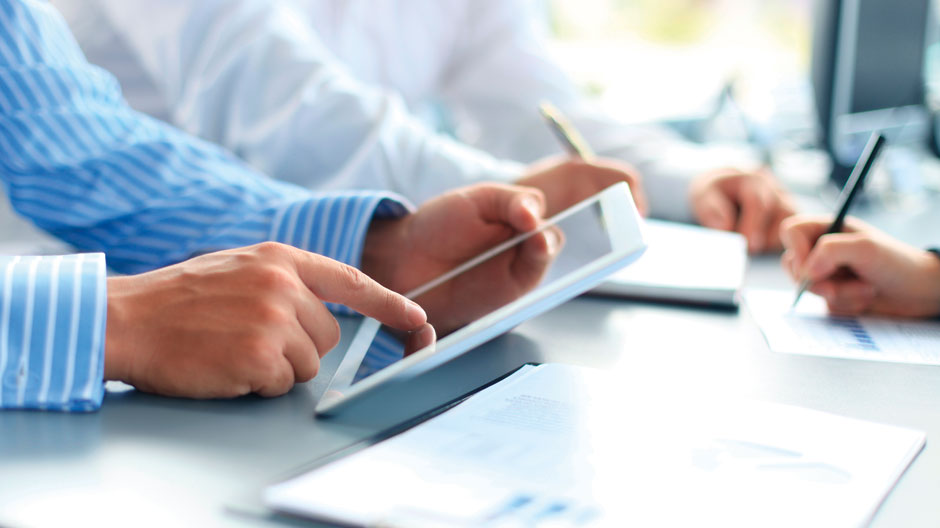 Business adviser analyzing financial figures denoting the progress in the work of the company.